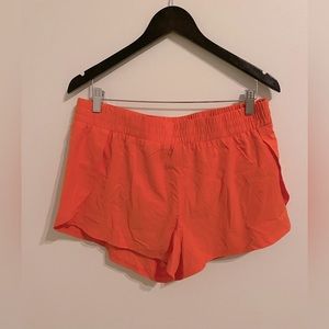 Brand new. AS revival. Orange shorts. Size L